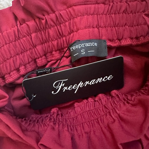 Red pants. Stretchy wide waistband. High waisted. - Picture 2 of 6